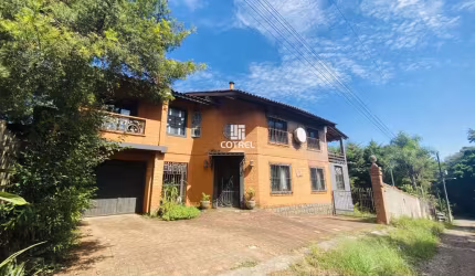 Casa à venda 3 dormitórios sendo 1 suíte, sacada, lareira e 1 vaga de garagem si