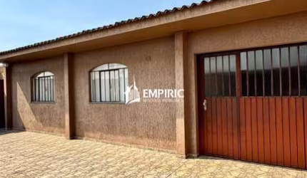 Casa com edícula na Santa Paula
