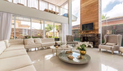 Enseada, Guarujá SP Casa à venda na Avenida Miguel Stéfano. 700 m², vista para o mar, piscina com jacuzzi, área gourmet, 5 suítes e 7 vagas.