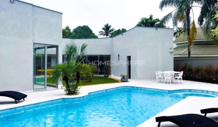 Casa à venda Riviera de São Lourenço Módulo 5, Alameda Açaí. Casa térrea à venda, 327 m², 6 suítes, piscina e área gourmet. A 200 mts da Praia