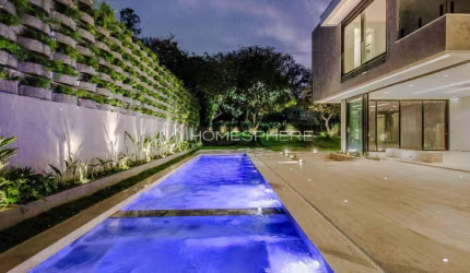 Alphaville Residencial Dois, Barueri - SP. Casa à venda na Alameda Colômbia, 910 m², 5 suítes, piscina, área gourmet, academia e 10 vagas no subsolo