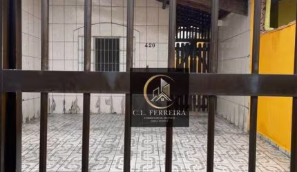 Casa com 2 dormitórios à venda, 82 m² por R$ 385.000 - Caiçara - Praia Grande/SP