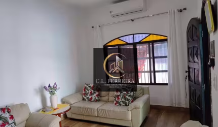 Casa com 3 dormitórios à venda, 159 m² por R$ 935.000,00 - Caiçara - Praia Grande/SP