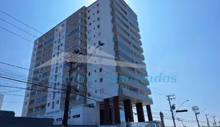 Apartamento de 2 quartos no Mirim, Praia Grande-SP: 1 suíte, sala, 2 banheiros, garagem e 76,45m² de área. Venha conferir!