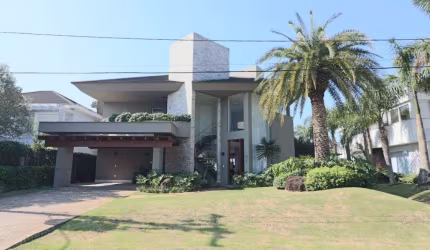 Casa em condomínio fechado com 4 quartos à venda na Avenida Central, 2500, Atlântida, Xangri-Lá por R$ 4.800.000
