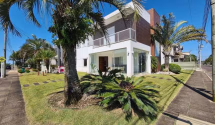 Casa em condomínio fechado com 5 quartos à venda na Avenida Central, 11, Zona Nova, Capão da Canoa por R$ 1.800.000