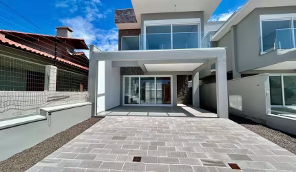 Casa com 3 quartos à venda na Rua José Milton Lopes, 363, Zona Nova, Capão da Canoa, 130 m2 por R$ 1.090.000