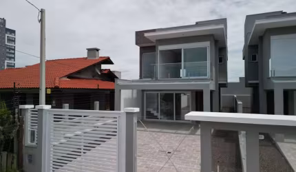 Casa com 3 quartos à venda na Rua José Milton Lopes, 367, Zona Nova, Capão da Canoa, 156 m2 por R$ 1.090.000
