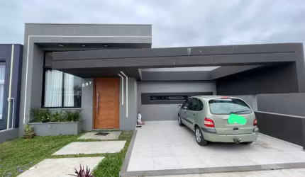Casa com 3 quartos à venda na Avenida Cristóvão Colombo, 207, Guarani, Capão da Canoa por R$ 1.150.000