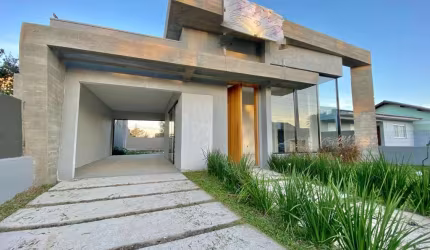 Casa com 3 quartos à venda na Rua Atum, 659, Jardim Beira Mar, Capão da Canoa por R$ 880.000