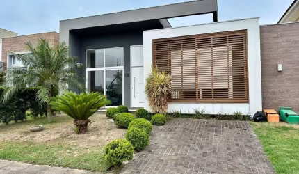 Casa em condomínio fechado com 3 quartos à venda na Avenida Central, 2000, Zona Nova, Capão da Canoa por R$ 1.399.000