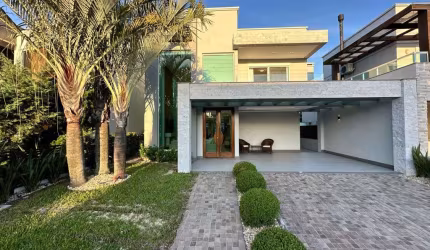 Casa em condomínio fechado com 4 quartos à venda na Avenida Central, 2000, Zona Nova, Capão da Canoa por R$ 2.690.000