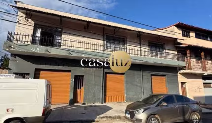 Casa com 2 lojas mais 3 barracões localizada no bairro Industrial /Contagem