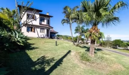 Casa em condomínio fechado com 3 quartos para alugar na Rua Flor de Pessegueiro, 105, Vila Nova, Porto Alegre, 249 m2 por R$ 7.000