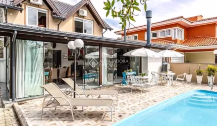Casa com 5 quartos para alugar na Rua das Guarajubas, 30, Jurerê Internacional, Florianópolis, 500 m2 por R$ 30.000