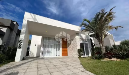 Casa à venda, com 4 quartos/dormitórios, e 2 vagas/box no condomínio Enseada, Xangri-Lá/RS