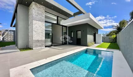 Casa à venda com 4 quartos/suítes e 2 vagas/box em Atlântida, Xangri-Lá/RS