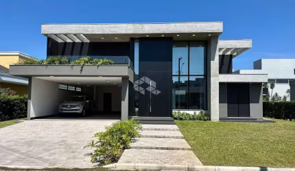 Sobrado com 4 Suítes, garagem coberta para 02 carros em Atlântida Sul/RS!