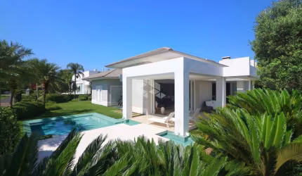 Casa com 4 quartos/dormitórios 2 vagas/box no condomínio Ilhas Park - Xangri-Lá/RS