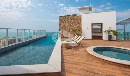 Apartamento 4 dormitórios e 3 vagas mobiliado e equipado com Vista para o Mar