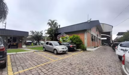 Pavilhão e prédio comercial em ótima localização