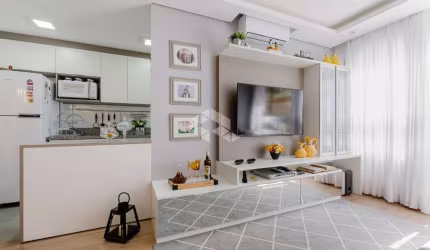 Apartamento semi-mobiliado de 64 m², 2 dormitórios sendo 1 suíte, 1 vaga.