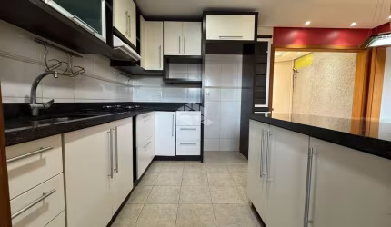 APARTAMENTO SEMI MOBILIADO, NO CENTRO DE BENTO GONÇALVES E 2 BOX DE GARAGEM