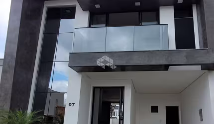 CASA DE 3 DORMITÓRIOS C/01 SUITE EM CONDOMINIO FECHADO