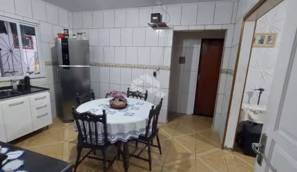 Lote com duas Casas no bairro Forquilhas, em São José- SC