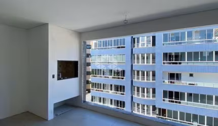 Apartamento novo à venda com 02 dormitórios,  01 suíte e sacada no bairro Nossa Senhora de Lourdes em Santa Maria, financiável.
