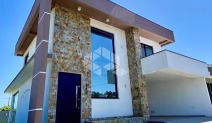Casa em Condomínio Fechado à venda em Camobi  com 3 suítes