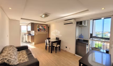 Apartamento mobiliado com 03 Dormitórios com churrasqueira na sacada e vaga escriturada no bairro Igara