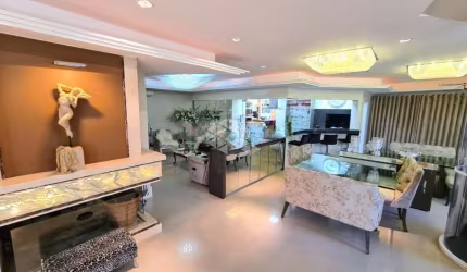 Casa em condomínio, 4 dormitórios com 429 m, 3 suítes, uma master com banheira, living 3 ambientes, semimobiliada, pátio com piscina, 4 vagas cobertas
