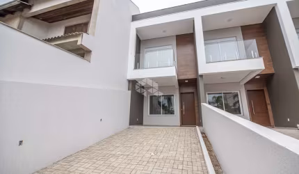 Casa Sobrado 2 Dormitórios com suíte, Sacada, Churrasqueira, lavabo, cozinha e sala integradas, área de serviço, 2 vagas e pátio , São José-Rs