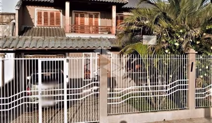 Casa com 3 dormitórios, 2 banheiros, Living estendido, vaga de garagem para 2 carros. No bairro Estância Velha em Canoas.