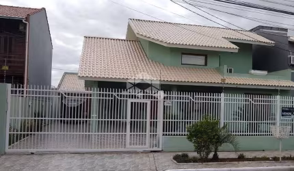 Casa Sobrado com 03 dormitórios no bairro Igara Canoas RS.