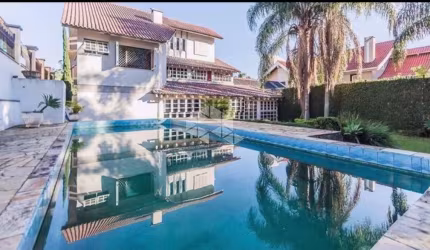 casa sobrado com 6 dormitórios, sendo 5 suítes, 4 vagas