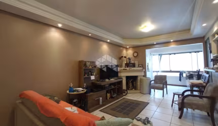 Apartamento 2 dormitórios com suíte, lareira e churrasqueira, uma quadra do mar em Capão da Canoa.