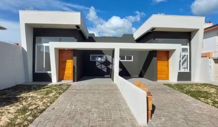 Casa geminada com 3 dormitórios/quartos e 2 vagas em Capão Da Canoa/Rs