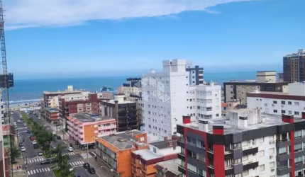 Três dormitórios mobiliado andar alto  no centro de Capão da Canoa RS