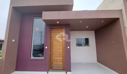 Casa 2 dormitórios sendo uma suíte, mobiliada, living, cozinha, terraço ,frente mar