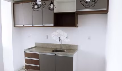 APARTAMENTO SEMIMOBILIADO COM 1 DORMITÓRIO E 1 VAGA ROTATIVA NO BAIRRO LOURDES EM CAXIAS DO SUL