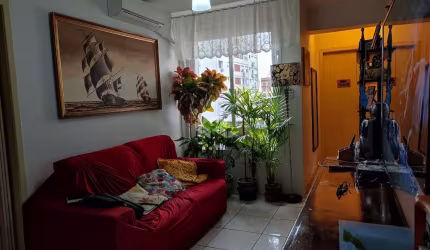 Apartamento de um dormitório no centro