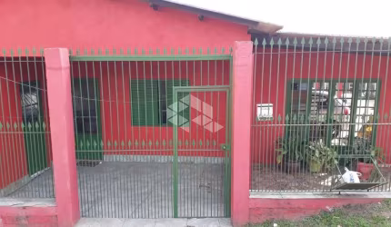 Casa com cinco dormitórios no bairro Aparecida em Alvorada-RS.