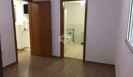 Crédito Real vende apartamento de 1 quarto com suíte no bairro Jardim Leopoldina em Porto Alegre-RS