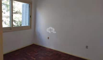 Apartamento para venda de frente com 2 dormitórios no bairro Jardim Botânico em Porto Alegre/RS.