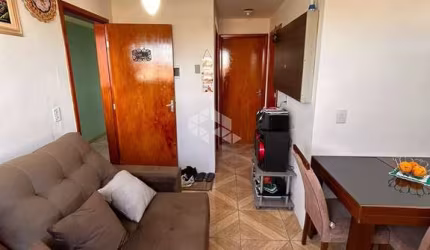 apartamento na dona mercedes, com 1 dormitorio, sala e cozinha , 1 vaga de garagem