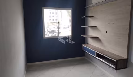 Seu Refúgio Acolhedor: Apartamento Térreo de 2 Dormitórios no Bairro Santos Dumont