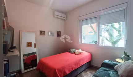 APARTAMENTO SEMIMOBILIADO COM 1 DORMITÓRO SEM VAGA - CIDADE BAIXA