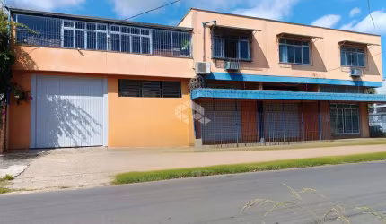 PRÉDIO COMERCIAL COM 3 LOJAS, 3 SALAS COMERCIAIS, DEPÓSITO E 3 VAGAS - SANTA MARIA GORETTI